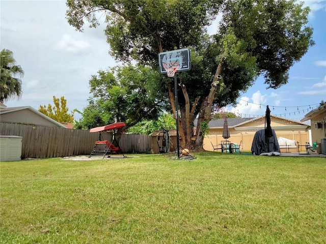 view of yard featuring cooling unit and a patio area