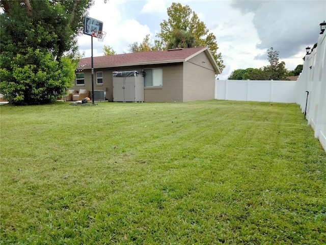 view of yard featuring central AC unit