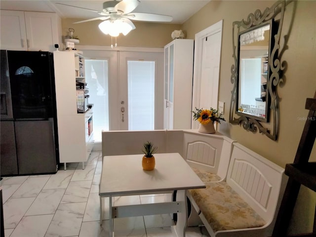 dining room with ceiling fan