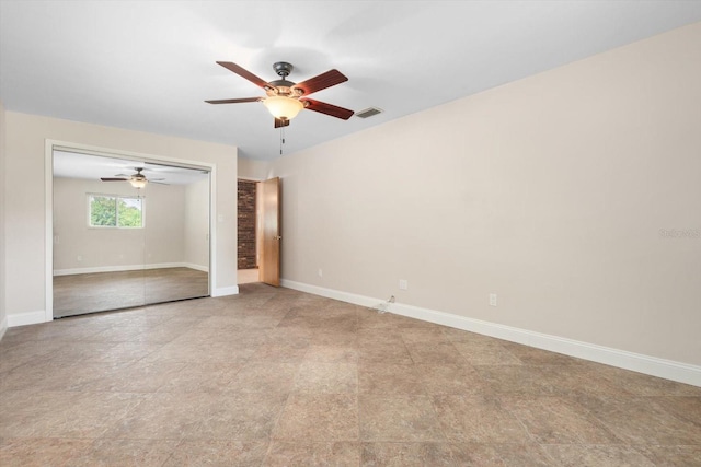 unfurnished room featuring ceiling fan