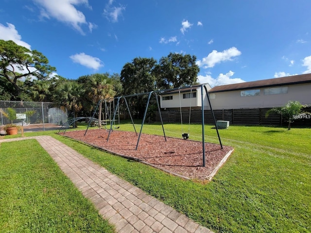 view of playground featuring a yard