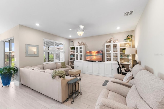 living room featuring ceiling fan