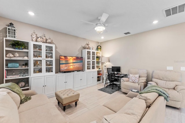 living room featuring ceiling fan