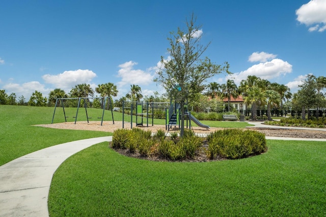 view of jungle gym featuring a lawn