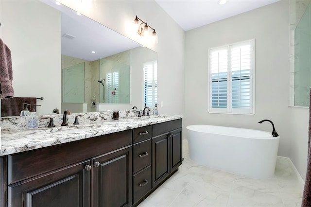 bathroom featuring a walk in shower, marble finish floor, double vanity, and a sink