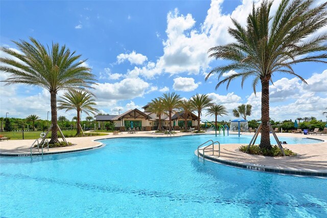 view of pool featuring a patio area