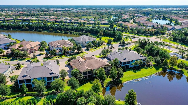 birds eye view of property featuring a water view