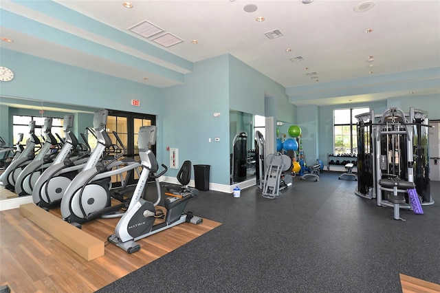 gym with wood-type flooring