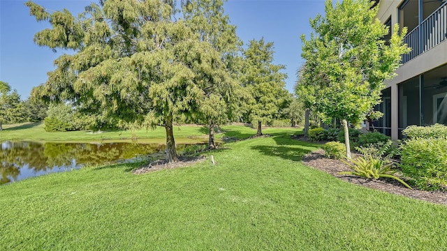 view of yard with a water view