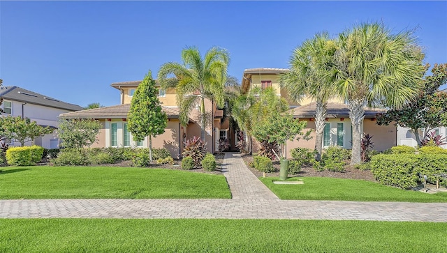 view of front facade featuring a front yard