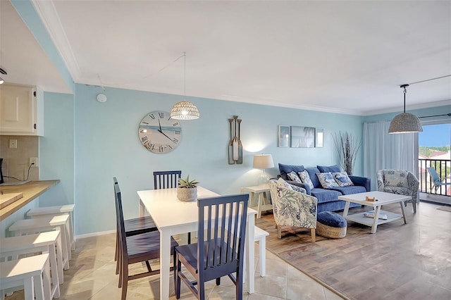 tiled dining area with crown molding