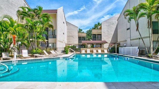 view of swimming pool featuring cooling unit