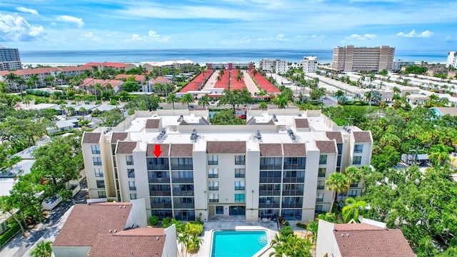 birds eye view of property featuring a water view