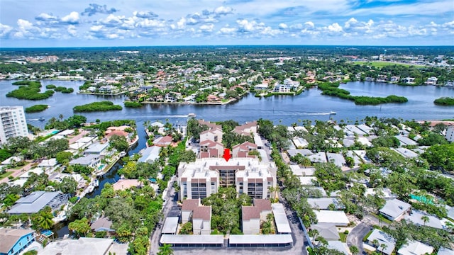 drone / aerial view with a water view