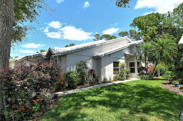 exterior space with a front yard