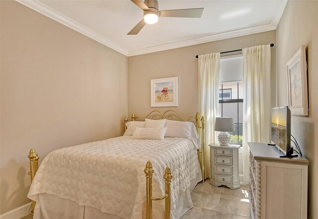 bedroom featuring ceiling fan, light tile patterned floors, and ornamental molding