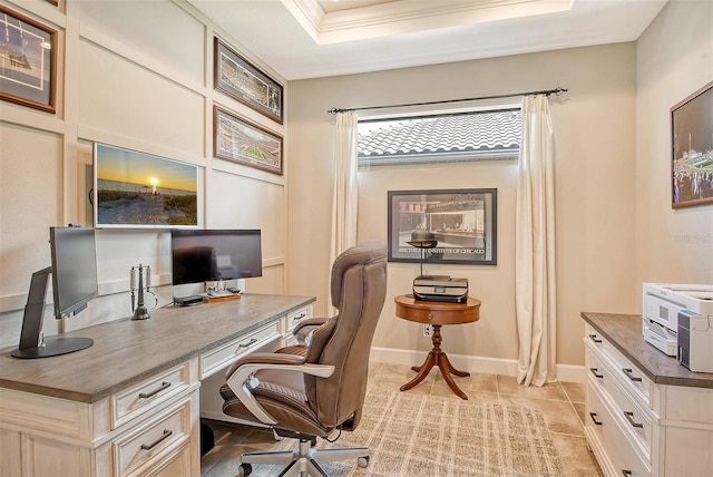 office with a tray ceiling, light tile patterned floors, and crown molding