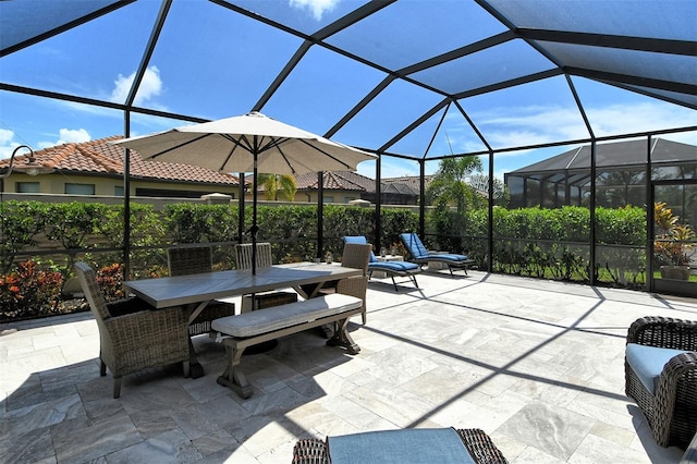 view of patio with a lanai