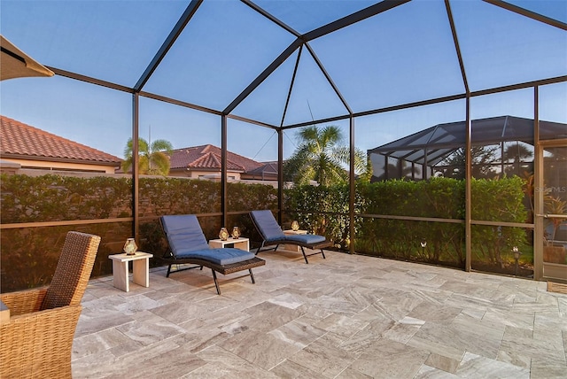 view of patio / terrace with glass enclosure