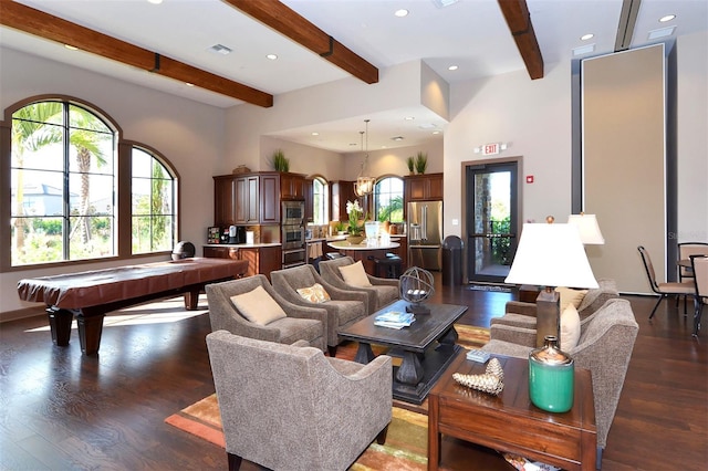 living room with beamed ceiling, billiards, dark hardwood / wood-style flooring, and a healthy amount of sunlight