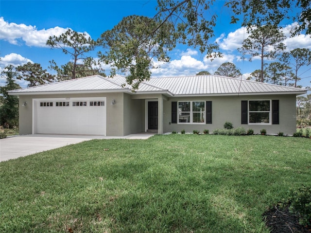 ranch-style house featuring a garage and a front yard