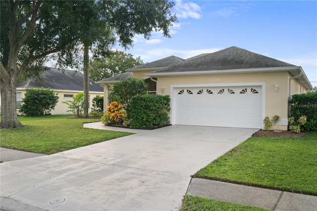 ranch-style home with a garage and a front yard