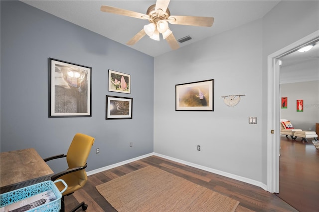 office space with dark wood-type flooring and ceiling fan