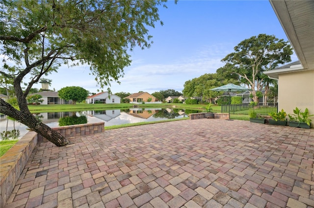 view of patio / terrace featuring a water view