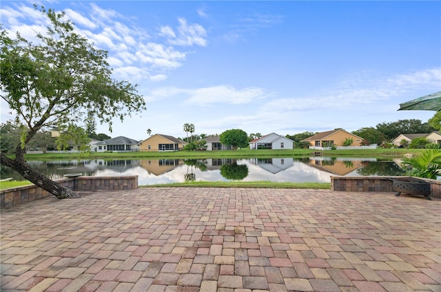 view of patio / terrace with a water view