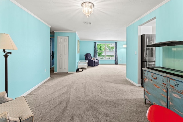 interior space featuring light carpet, a chandelier, and ornamental molding