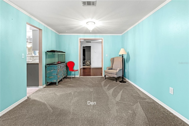 living area featuring ornamental molding, sink, and carpet flooring