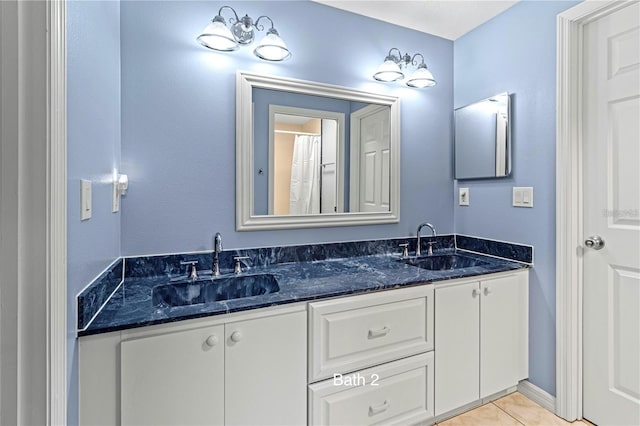 bathroom featuring vanity and tile patterned floors