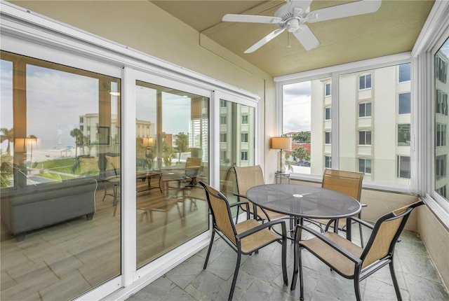 sunroom / solarium with ceiling fan