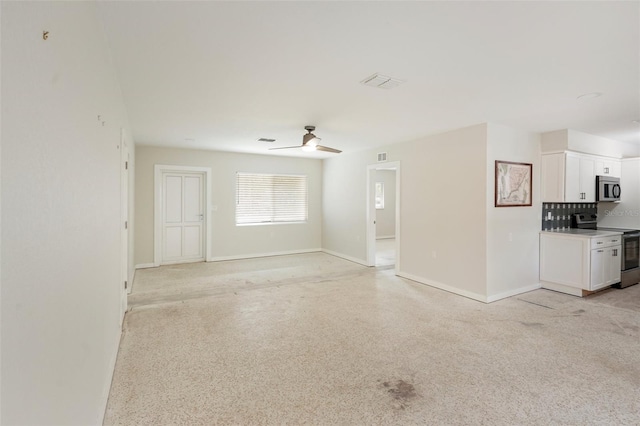 unfurnished living room featuring ceiling fan