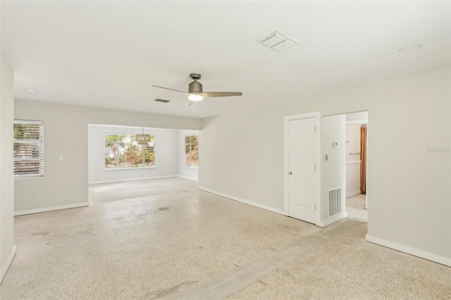 spare room featuring ceiling fan