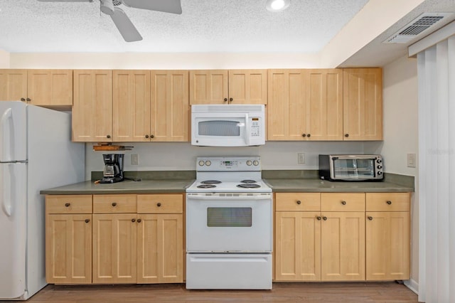 kitchen with ceiling fan, light brown cabinets, white appliances, wood-type flooring, and a textured ceiling