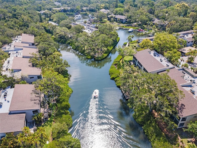 drone / aerial view with a residential view and a water view