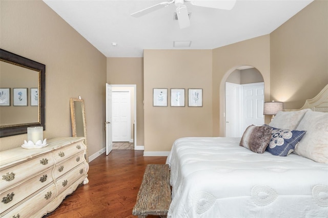 bedroom with dark wood-type flooring and ceiling fan