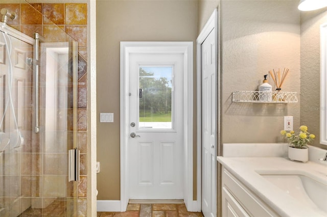 doorway to outside featuring sink