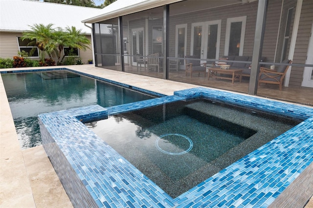 view of pool with a sunroom