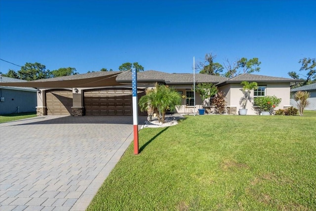 4457 Maywood Ln, North Port, FL 34286 - ranch-style house with a front lawn and a garage