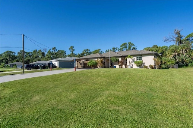 single story home with a front yard