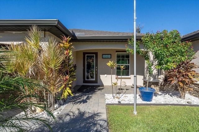 property entrance with a patio