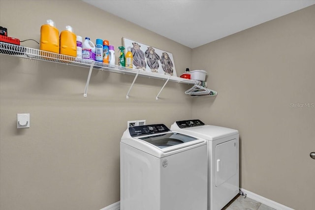 laundry area with washing machine and dryer