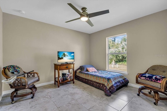 tiled bedroom with ceiling fan