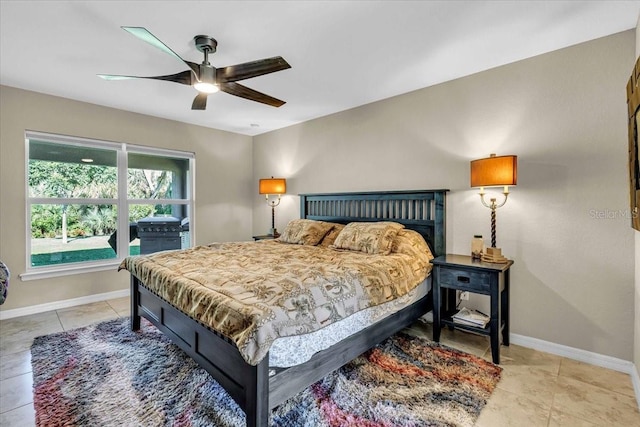 tiled bedroom with ceiling fan