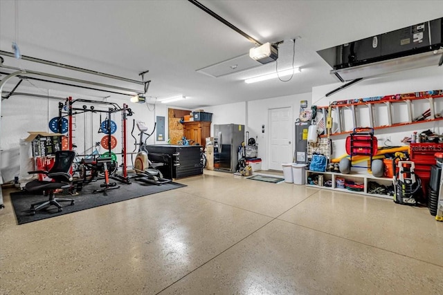 garage with stainless steel refrigerator with ice dispenser, electric panel, and a garage door opener