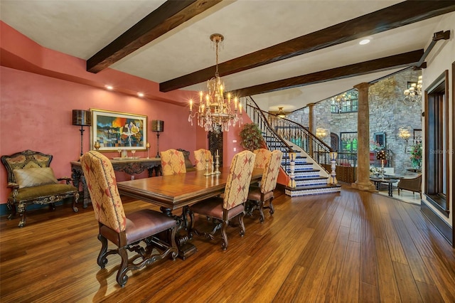 dining area featuring a notable chandelier, beamed ceiling, and hardwood / wood-style flooring