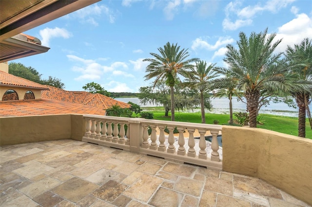 view of patio / terrace featuring a water view