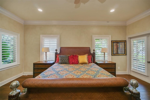 bedroom featuring ceiling fan, crown molding, dark wood-type flooring, and multiple windows